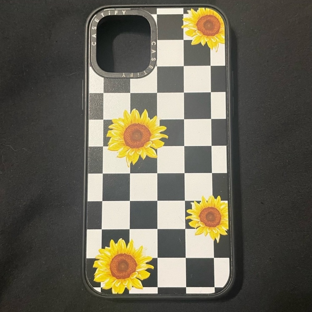 Casetify Black and White Checkered Sunflower Phone Case for iPhone 11.